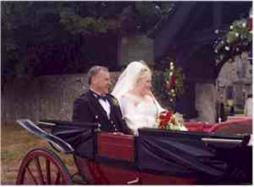 The proud father arrives at church with the bride