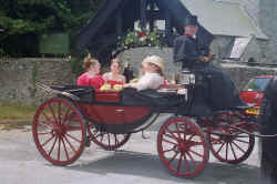 Click to view larger picture.

Brides Mother and Bridesmaids arrive at Church